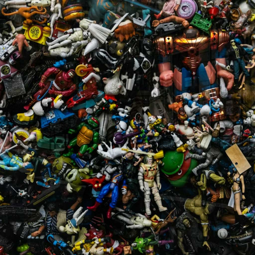 a pile of assorted action figures