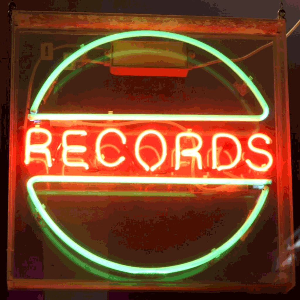 a neon sign that say Records